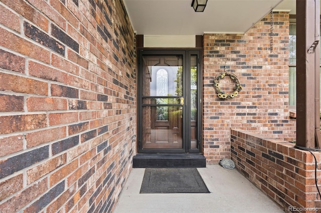 4677 S Wolff St, Denver, CO 80236 - property entrance featuring brick siding