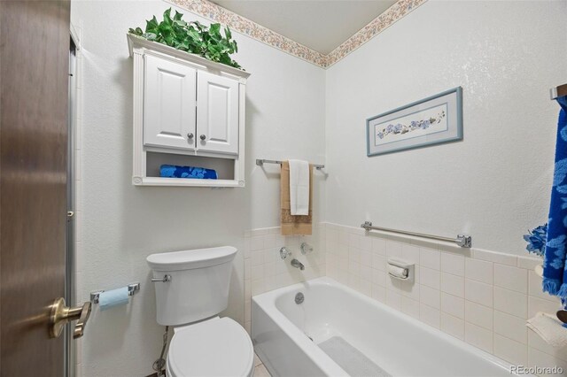 4677 S Wolff St, Denver, CO 80236 - full bathroom featuring a garden tub and toilet