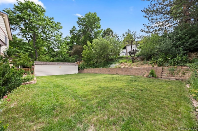 4677 S Wolff St, Denver, CO 80236 - view of yard featuring an outbuilding