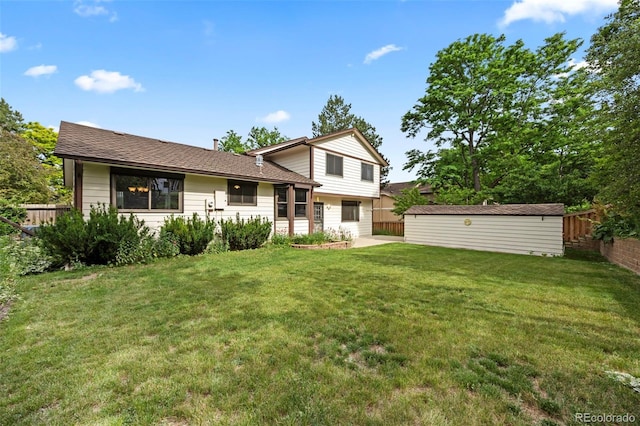 4677 S Wolff St, Denver, CO 80236 - split level home with an outdoor structure