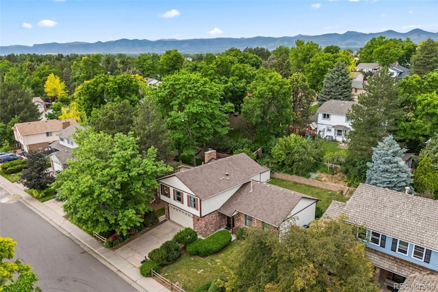 4677 S Wolff St, Denver, CO 80236 - aerial view of residential area featuring a mountain backdrop