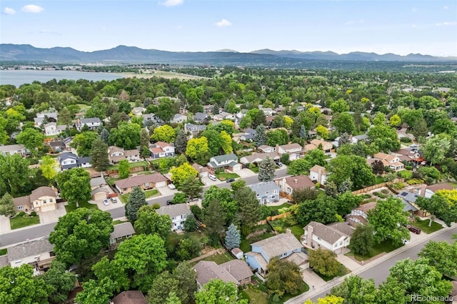 4677 S Wolff St, Denver, CO 80236 - aerial view of residential area with a water and mountain view