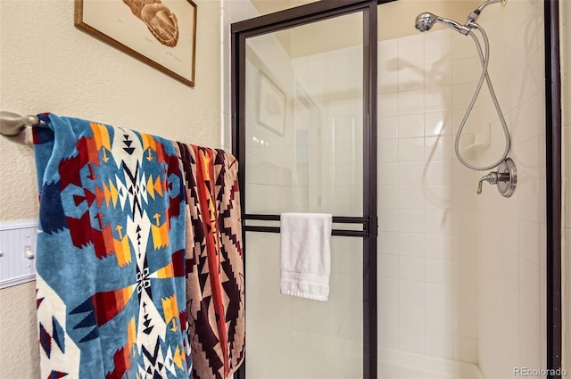 8445 S Holland Way Unit 205, Littleton, CO 80128 - full bath with a shower stall and a textured wall