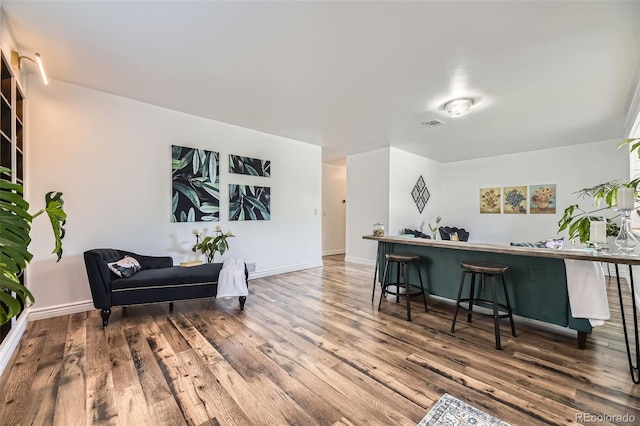 947 S Yates St, Denver, CO 80219 - sitting room featuring wood finished floors and baseboards