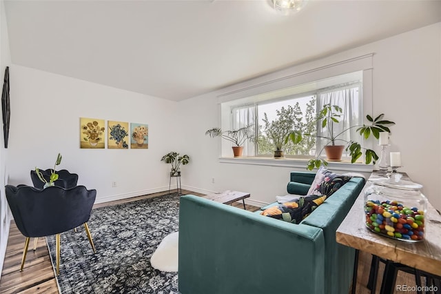 947 S Yates St, Denver, CO 80219 - living room featuring wood finished floors and baseboards