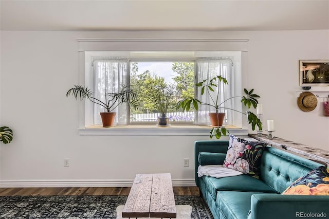 947 S Yates St, Denver, CO 80219 - living area with wood finished floors and baseboards