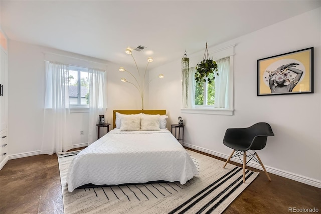 947 S Yates St, Denver, CO 80219 - bedroom featuring multiple windows and baseboards