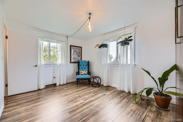 947 S Yates St, Denver, CO 80219 - sitting room with wood finished floors