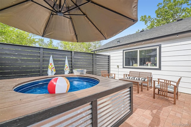 947 S Yates St, Denver, CO 80219 - view of swimming pool featuring a jacuzzi, a deck, a patio, and an outdoor hangout area