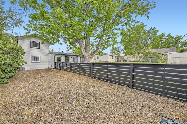 947 S Yates St, Denver, CO 80219 - view of yard featuring central AC
