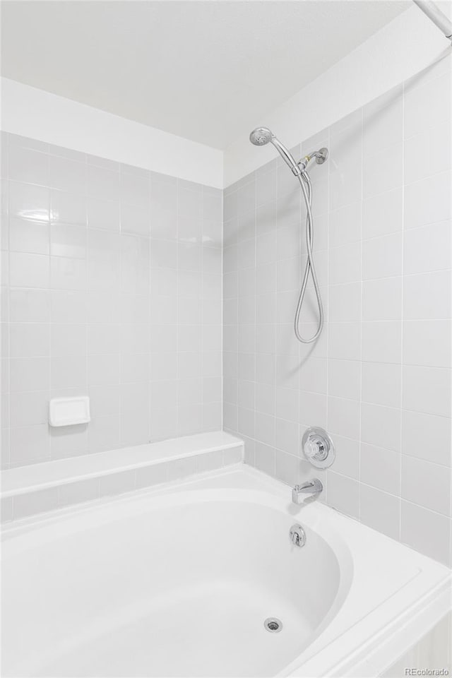 923 S Fairplay St, Aurora, CO 80012 - full bathroom featuring shower / tub combination