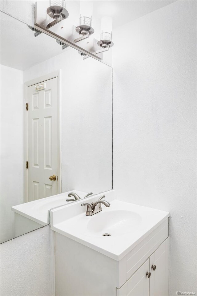 923 S Fairplay St, Aurora, CO 80012 - bathroom featuring vanity