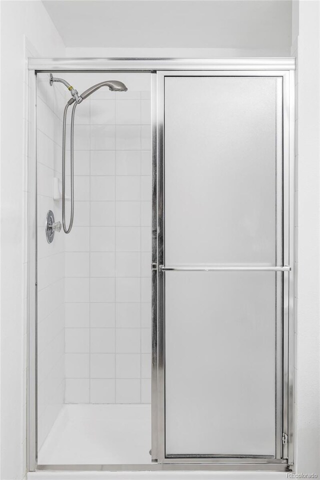 923 S Fairplay St, Aurora, CO 80012 - full bath featuring a stall shower