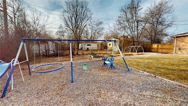 view of playground featuring a lawn