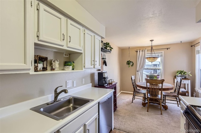 kitchen with light carpet, range with electric cooktop, light countertops, and a sink