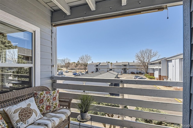 balcony featuring a residential view