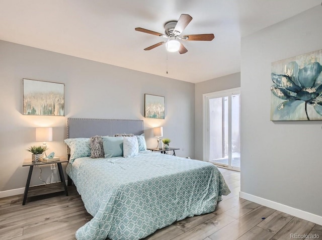 8330 Zuni St Unit 116, Denver, CO 80221 - bedroom featuring wood finished floors and a ceiling fan