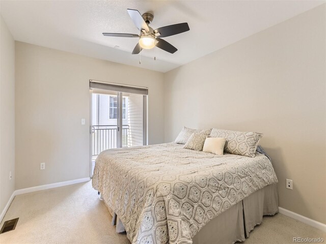 453 S Quay St, Lakewood, CO 80226 - bedroom with visible vents, light carpet, baseboards, access to outside, and a ceiling fan