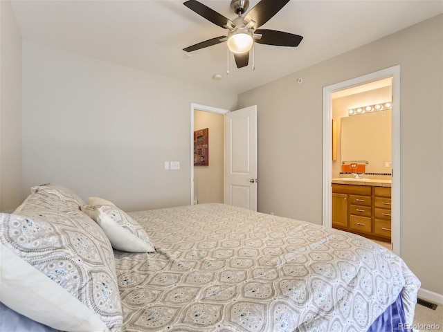 453 S Quay St, Lakewood, CO 80226 - bedroom with visible vents, a sink, ceiling fan, and ensuite bath