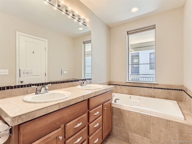 453 S Quay St, Lakewood, CO 80226 - full bath featuring plenty of natural light, a sink, and a bath