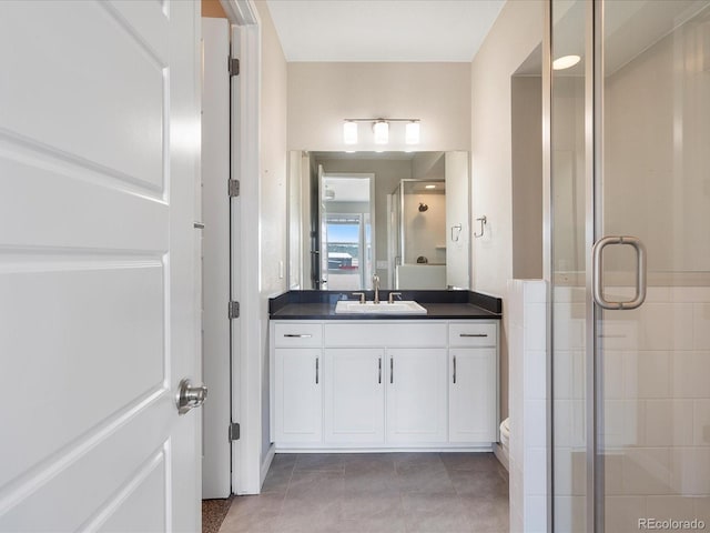 3654 Penang Dr, Castle Rock, CO 80109 - full bathroom featuring a stall shower, vanity, and tile patterned flooring