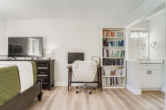 17630 E Loyola Dr Unit 1812L, Aurora, CO 80013 - office area with light wood-type flooring and baseboards