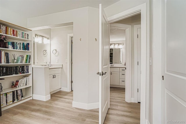 17630 E Loyola Dr Unit 1812L, Aurora, CO 80013 - corridor featuring light wood-type flooring
