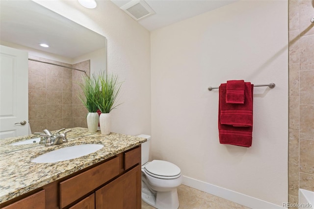671 Robert St, Longmont, CO 80503 - full bathroom with vanity, toilet, a shower, tile patterned floors, and baseboards