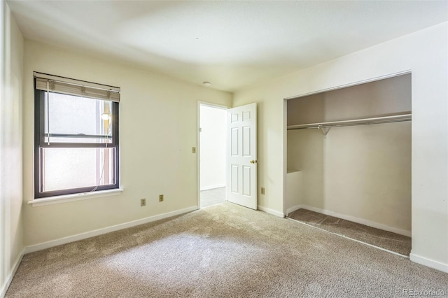 225 E 8th Ave Unit 10, Longmont, CO 80504 - unfurnished bedroom featuring carpet floors and a closet