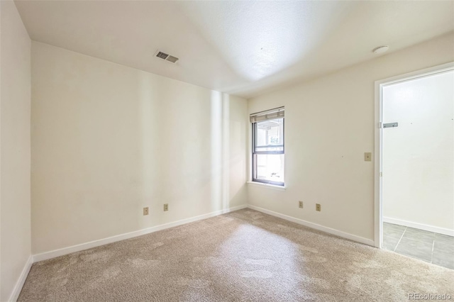 225 E 8th Ave Unit 10, Longmont, CO 80504 - empty room featuring carpet and baseboards