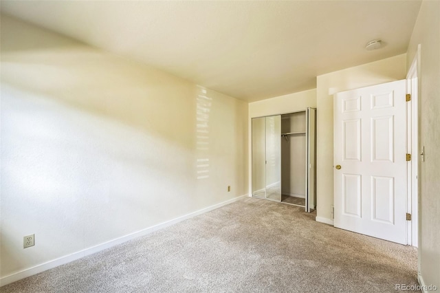225 E 8th Ave Unit 10, Longmont, CO 80504 - unfurnished bedroom with carpet flooring and a closet