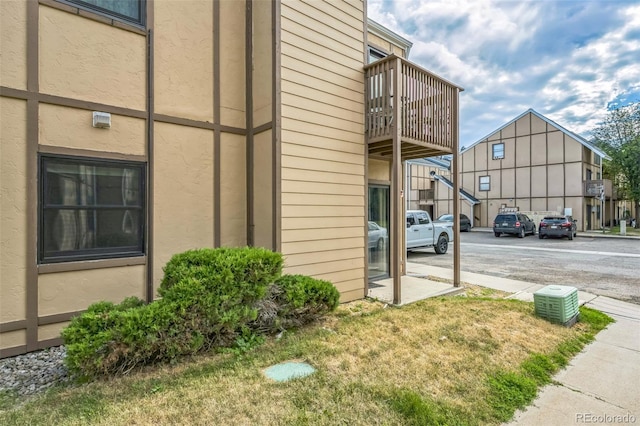 225 E 8th Ave Unit 10, Longmont, CO 80504 - view of building exterior featuring uncovered parking