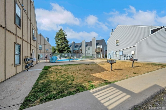 225 E 8th Ave Unit 10, Longmont, CO 80504 - view of community featuring a residential view and a pool