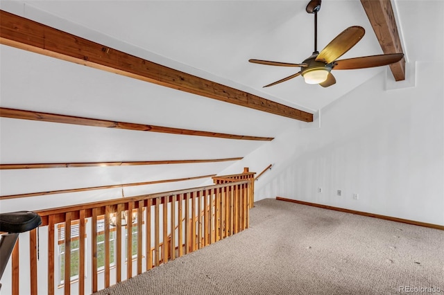 corridor featuring lofted ceiling with beams and carpet