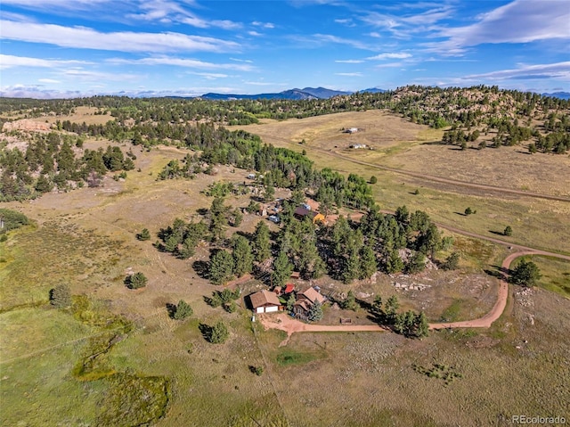 birds eye view of property featuring a rural view and a mountain view