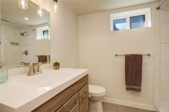 full bath featuring walk in shower, vanity, toilet, and tile patterned floors