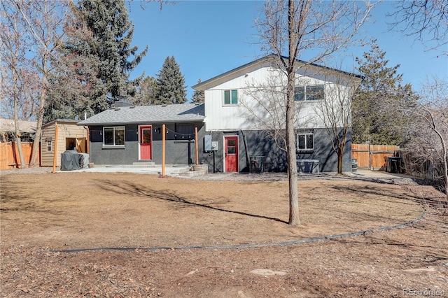 tri-level home with fence