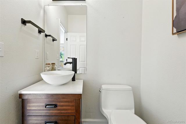6039 Quay Ct, Arvada, CO 80003 - half bath with vanity and toilet
