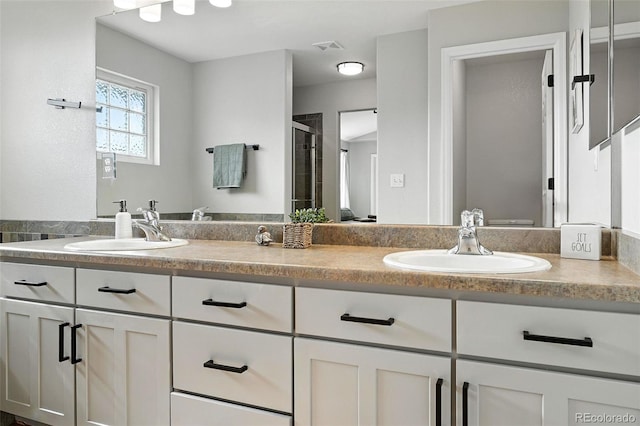 6039 Quay Ct, Arvada, CO 80003 - full bath featuring double vanity and a shower stall