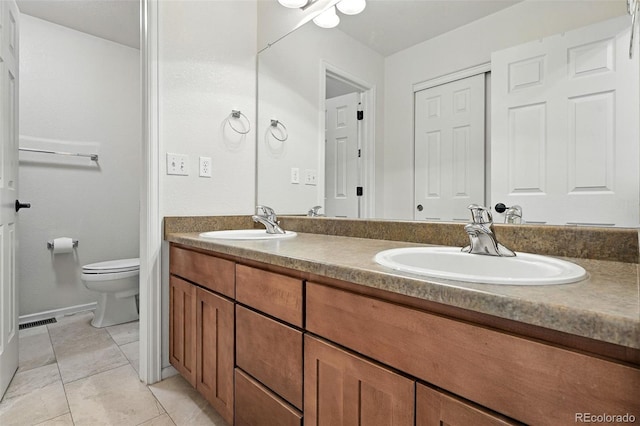 6039 Quay Ct, Arvada, CO 80003 - full bathroom featuring double vanity and tile patterned flooring