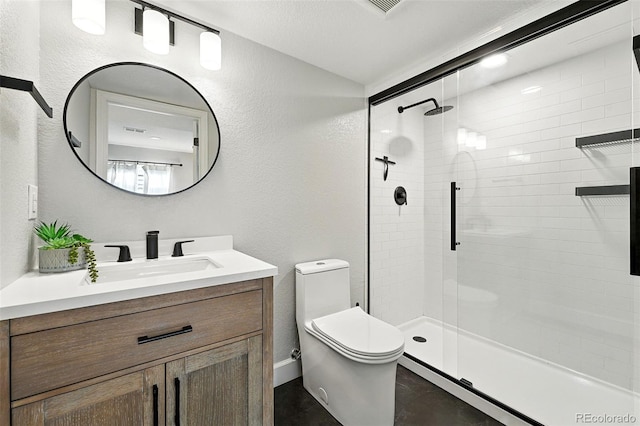 6039 Quay Ct, Arvada, CO 80003 - full bathroom featuring vanity, a stall shower, and a textured wall