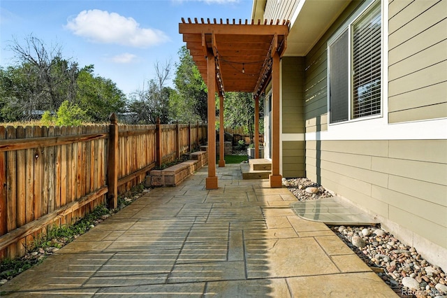 6039 Quay Ct, Arvada, CO 80003 - fenced backyard featuring a patio
