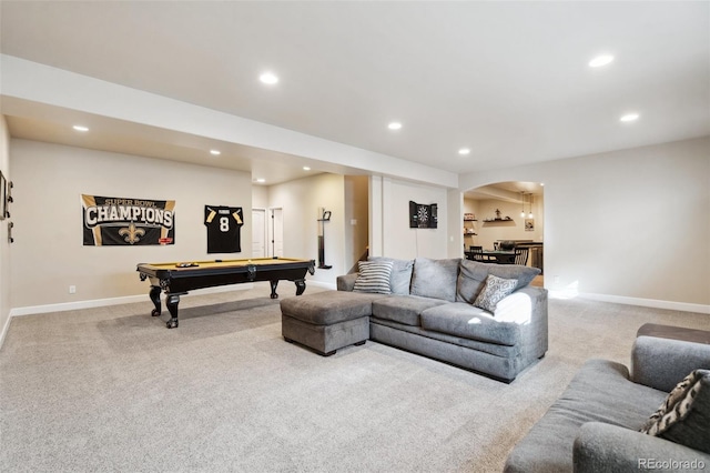 12441 Woodruff Dr, Colorado Springs, CO 80921 - living area featuring carpet floors, arched walkways, recessed lighting, billiards table, and baseboards