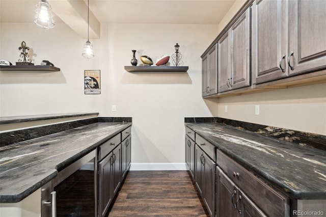 12441 Woodruff Dr, Colorado Springs, CO 80921 - kitchen with open shelves, wine cooler, dark wood-type flooring, baseboards, and dark brown cabinets