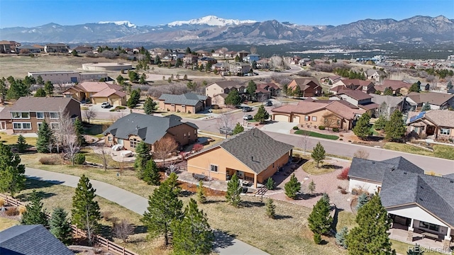 12441 Woodruff Dr, Colorado Springs, CO 80921 - aerial view of residential area featuring a mountain backdrop