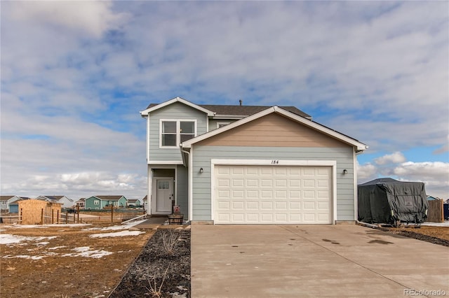 view of front facade featuring a garage and concrete driveway