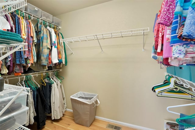 21395 E Greenwood Pl, Aurora, CO 80013 - spacious closet with wood finished floors
