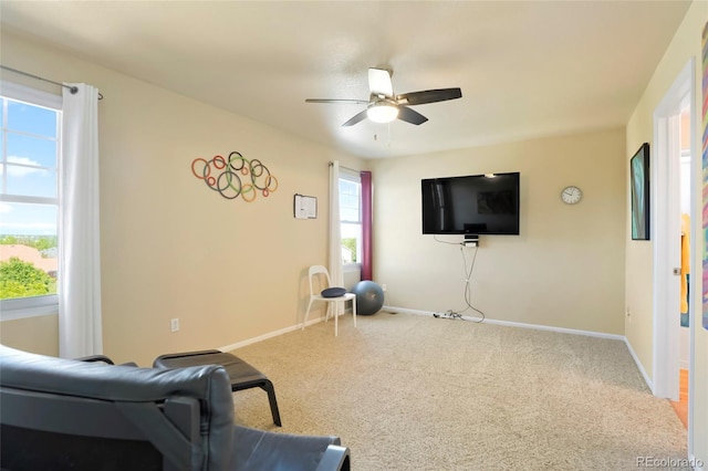 21395 E Greenwood Pl, Aurora, CO 80013 - living area featuring ceiling fan, carpet flooring, and baseboards