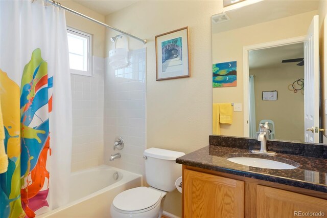 21395 E Greenwood Pl, Aurora, CO 80013 - bathroom with shower / bathtub combination with curtain, toilet, and vanity