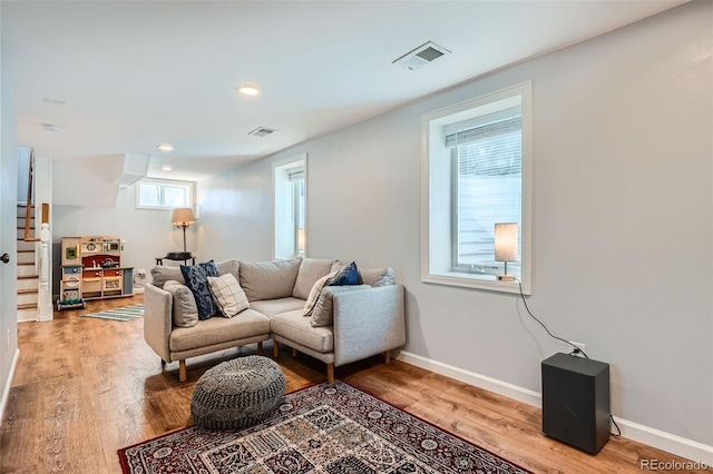 2252 S Lafayette St, Denver, CO 80210 - living room with visible vents, recessed lighting, light wood finished floors, and baseboards